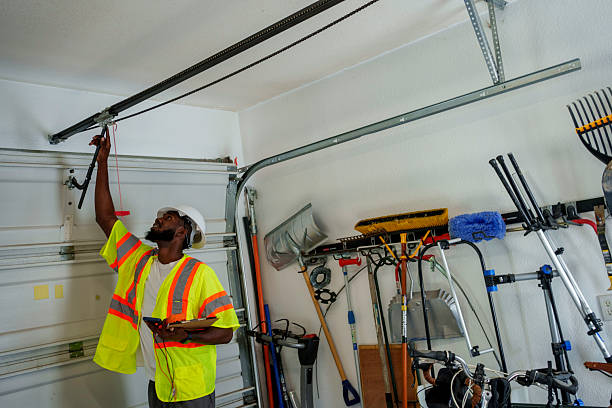 Professional Garage Door Panel Replacement technician working in Kinsey, AL